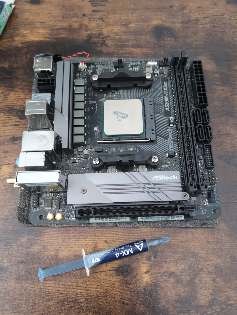 Install processor and apply thermal paste